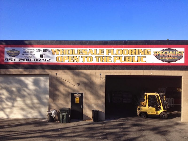 Specialist N Flooring warehouse entrance with wholesale pricing banner